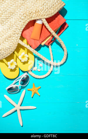 beach accessories on the blue wooden board Stock Photo