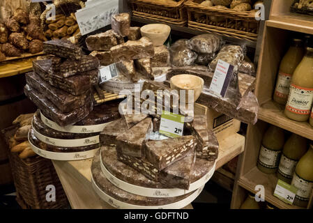 A large selection of dutch cheeses in a delicatessen in Amsterdam, Holland, Netherlands. Stock Photo