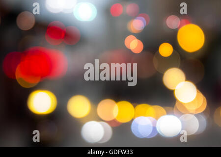 defocused image light of city streetlights in autumn evening Stock Photo