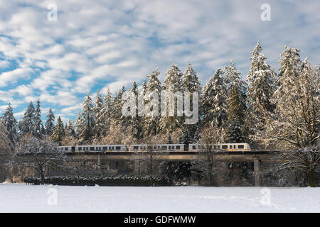 Burnaby - February 25, 2014 - Metro Vancouver’s Skytrain moving along during a cold winter morning in Burnaby, British Columbia, Stock Photo