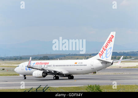 Aircraft -Boeing 737- of -Air Europa- operator, direction to runway, ready to take off from Madrid airport. Stock Photo