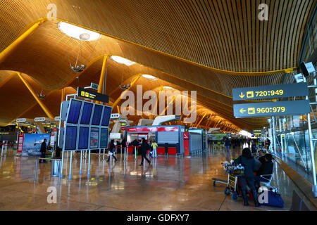 Avianca check in desks and departures information board in Terminal 4, Adolfo Suárez Madrid–Barajas Airport, Madrid, Spain Stock Photo