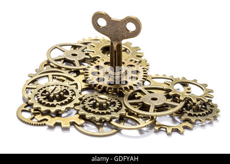 gear heart with key on white Stock Photo