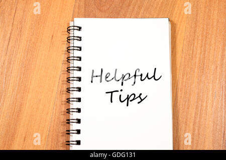 Helpful tips text concept write on notebook Stock Photo