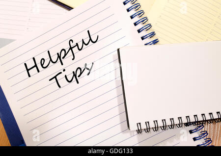 Helpful tips text concept write on notebook Stock Photo