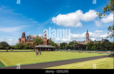 Kelvingrove Lawn Bowls and Tennis Centre with Kelvingrove Art Gallery and Museum left & The University of Glasgow right Scotland Stock Photo