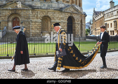 The Encaenia ceremony at the University of Oxford in 2015 including Chancellor Chris Patten walking past the Radcliffe Camera Stock Photo