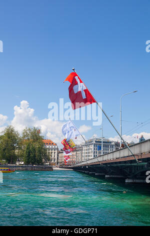 Flags on the Pont du Mont Blanc as it spans Lake Geneva Stock Photo