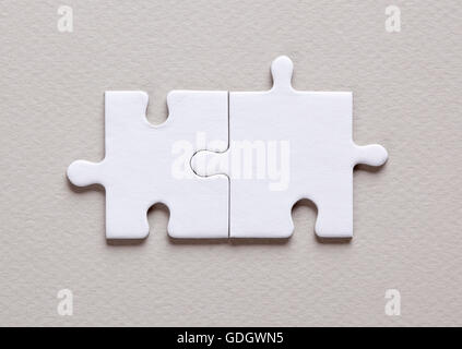Two blank white puzzle pieces Stock Photo
