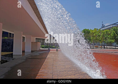 LISBON, PORTUGAL - JUNE 16, 2015: Marvelous cityscape view of waterfall in the Water Gardens located at the Park of Nations Stock Photo