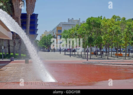 LISBON, PORTUGAL - JUNE 16, 2015: Marvelous cityscape view of waterfall in the Water Gardens located at the Park of Nations Stock Photo