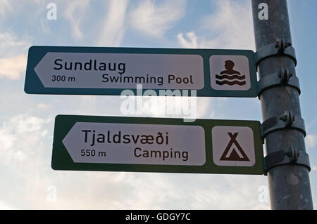 Iceland: camping sign and swimming pool sign in the streets of Akureyri, the city of the midnight sun, considered the capital of the north of Iceland Stock Photo