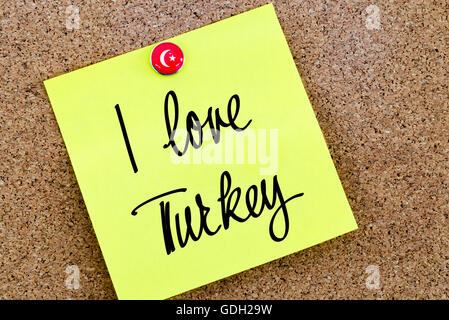 Written text I Love Turkey over yellow paper note pinned on cork board Stock Photo