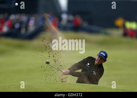 USA's Phil Mickelson plays out of the bunker on the 18th hole during day three of The Open Championship 2016 at Royal Troon Golf Club, South Ayrshire. Stock Photo