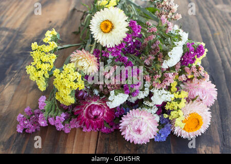 Bouquet of Flowers, Statice and Strawflower ( Limonium Sinuatum and Helichrysum Bracteatum ). Stock Photo