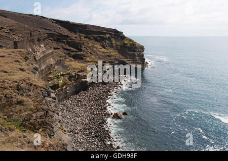 Iceland: the rocks and the black sand of Krysuvikurberg Cliffs, in the geothermal area of Krysuvik Stock Photo