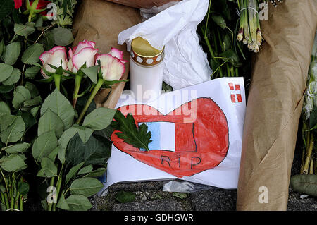 Copenhagen, Denmark. 17th July, 2016. European Union and French flags at half-mast at the French Embassy.  People pay tribute to the terrorist victims in Nice, France with flowers. Credit:  Francis Joseph Dean/Dean Pictures/Alamy Live News Stock Photo