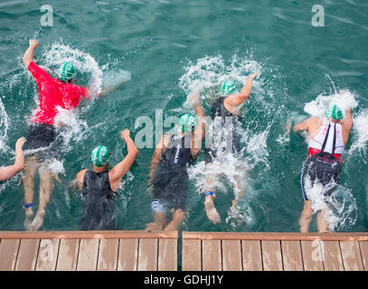 Triathlon open water sea swim start. Stock Photo