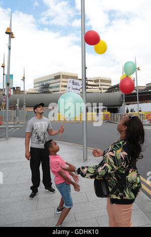 London, UK. 17th July, 2016. Family friend Ava Morgan releases balloons for Eighteen-year-old Mzee Mohammed who died after being detained by police and security staff at shopping centre in Liverpool.The Independent Police Complaints Commission has launched an investigation. Credit:  Thabo Jaiyesimi/Alamy Live News Stock Photo