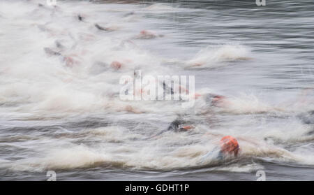 Hamburg, Germany. 16th July, 2016. Triathletes swimming in the 7th station of the men's triathlon at the World Triathlon Series in Hamburg, Germany, 16 July 2016. Photo: LUKAS SCHULZE/dpa/Alamy Live News Stock Photo