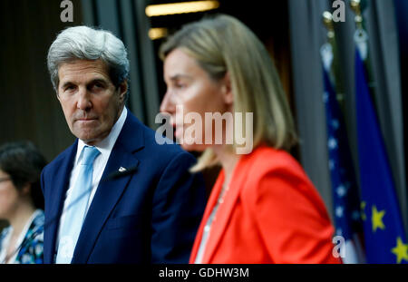 Brussels, Belgium. 18th July, 2016. U.S. Secretary of State John Kerry (L) and EU high representative for foreign affairs and security policy Federica Mogherini attend a joint press conference after their meeting ahead of an EU foreign ministers' meeting at its headquarters in Brussels, Belgium, July 18, 2016. John Kerry is in Belgium to attend a meeting with EU member states' foreign ministers on the sidelines of the ongoing EU Foreign Affairs Council meeting. © Ye Pingfan/Xinhua/Alamy Live News