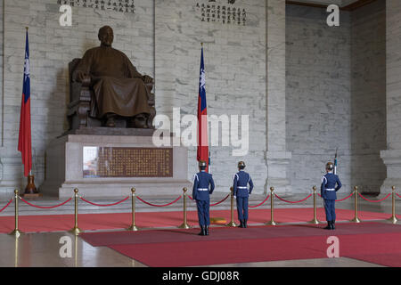 Taipei, Taiwan - January 08, 2015: Changing of guards procession inside Chiang Kai-Shek memorial hall. Stock Photo