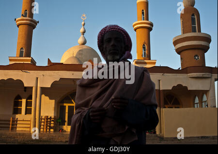 Muslim man in front of a mosque ( Ethiopia) Stock Photo