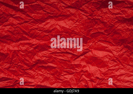 Crumpled red wrapping paper Stock Photo