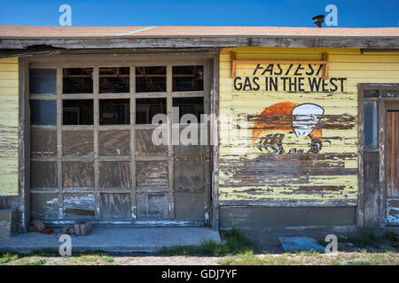 Old mural at abandoned gas station in historic silver mining town of Pioche, Great Basin, Nevada, USA Stock Photo