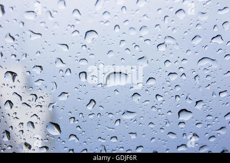 Drops of rain on glass , rain drops on clear window Stock Photo
