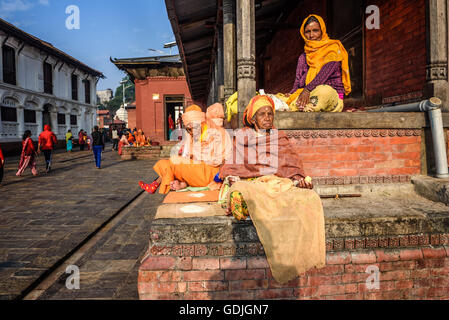 Old women begging at Pashupatinath Temple complex in Kathmandu Stock Photo