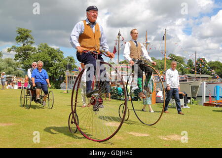 Two vintage Penny-farthing bicycles at the Traditional Boat Festival in Henley Stock Photo