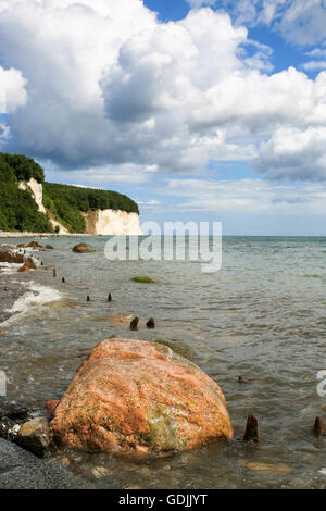 Ruegen island beach with Baltic sea and chalk cliffs in the background Stock Photo