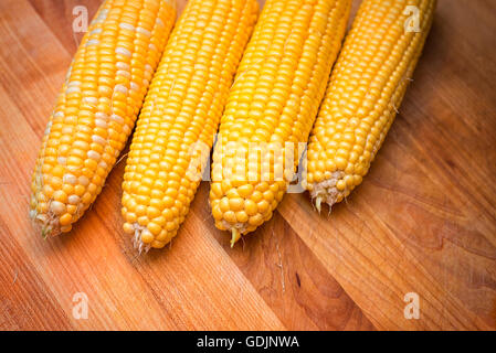 Fresh corn ready to be cooked and eaten. Stock Photo