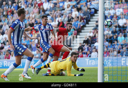 Liverpool's Danny Ings scores his side's first goal of the game during the pre-season friendly match at the DW Stadium, Wigan. Stock Photo