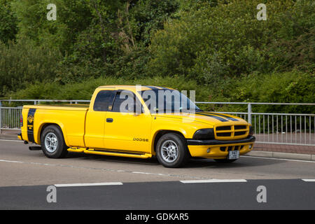 2000 Yellow American Dodge Ram 1500 Rumble Bee  3900cc petrol truck at a festival of Transport including cars, vans, imports, classics trucks, rare unusual vehicles, displayed in the in the streets of the seaside town of Fleetwood, Lancashire, UK. Stock Photo