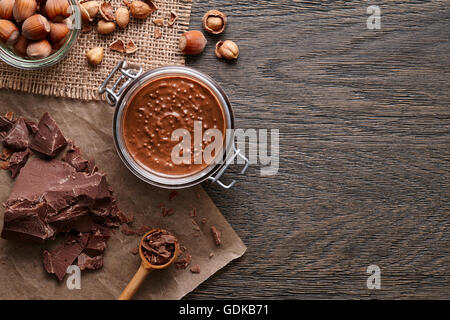 Background with hazelnut spread and ingredients Stock Photo