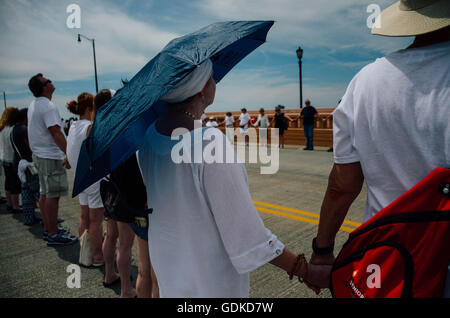 Cleveland, United States. 17th July, 2016. Peacful protesters are seen gathering on Hope Memorial Bridge during the Republican National Convention in Cleveland, Ohio on July, 17, 2016. Credit:  Megan Jelinger/Pacific Press/Alamy Live News