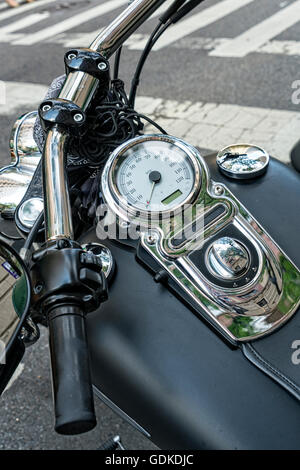 Close up of a Motorcycle Handle Bars and Control Panel, Parked on a New York City Street Stock Photo