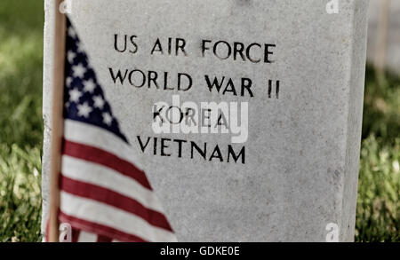 United States Flag on a soldier's gravesite at Arlington National Cemetery on Memorial Day Stock Photo