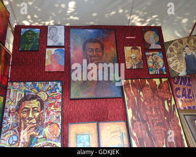 Koronadal City, Philippines. 18th July, 2016. Paintings of artistic and different faces of newly elected Philippine President Rodrigo Duterte were showcased and sold during the 50th founding anniversary of South Cotabato in Mindanao. © Sherbien Dacalanio/Pacific Press/Alamy Live News Stock Photo