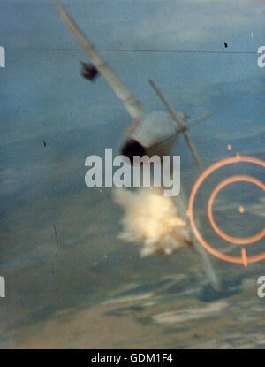 Death of a MIG. Firing his 20mm cannon at point-blank range, Major ...