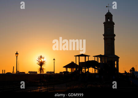 Herne Bay, Kent, UK. 19th July 2016: UK Weather. Sunrise at Herne Bay by the clock tower on the day forecast to be the hottest of the year with temperatures up to 33°C. With the approaching school summer holidays, the seafront will become busy with holiday makers Credit:  Alan Payton/Alamy Live News Stock Photo