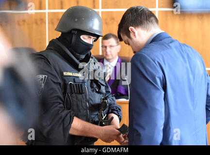 Brno, Czech Republic. 19th July, 2016. Court proceeding with U.S. citizen Kevin Dahlgren (right) charged with quadruple murder of his Czech relatives in Brno, Czech Republic, July 19, 2016. Dahlgren is suspected of having brutally killed the family with w Stock Photo