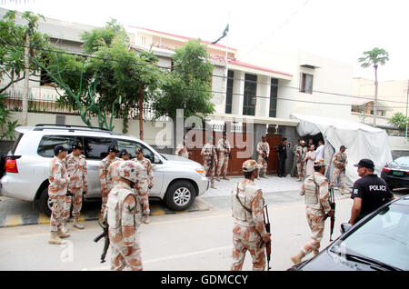 Security officials stand alert to avoid untoward incident outside Sindh High Court Chief Justice Sajjad Ali Shah residency after recovery his son Advocate Awais Ali Shah, in Karachi on Tuesday, July 19, 2016. Stock Photo