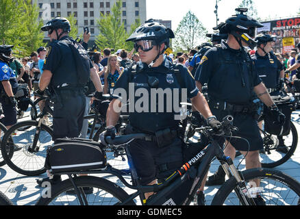 Cleveland, USA. 19th July, 2016. Police officers stand guard during a rally outside the Republican National Convention in Cleveland, Ohio, the United States, July 19, 2016. Credit:  Bao Dandan/Xinhua/Alamy Live News Stock Photo