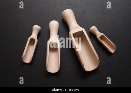 Wooden scoops - bailer isolated on a black background Stock Photo