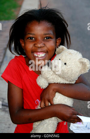 African girl with teddy bear, South Africa Stock Photo - Alamy