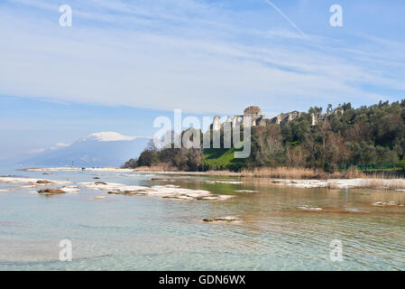 Grottoes of Catullus and Lake Garda in Sirmione which is a peninsula that divides the lower part of Lake Garda. Stock Photo