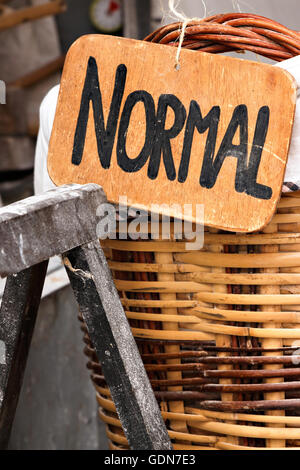 Basket for normal bread on a craftsman market.Vertical image. Stock Photo